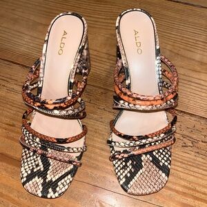 Aldo Trelidda strappy sandals with a snakeskin print. Size 8.5.